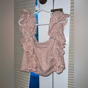 pink ruffled top